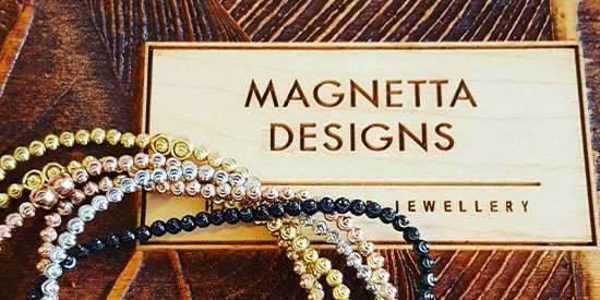 Magnetta Designs logo